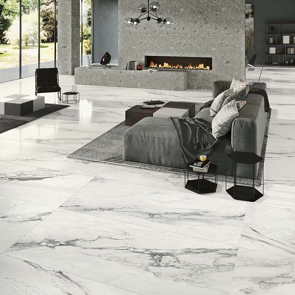 Bernini polished porcelain tile with a white marble design, for floors and walls. Made in Italy, installed in a room.