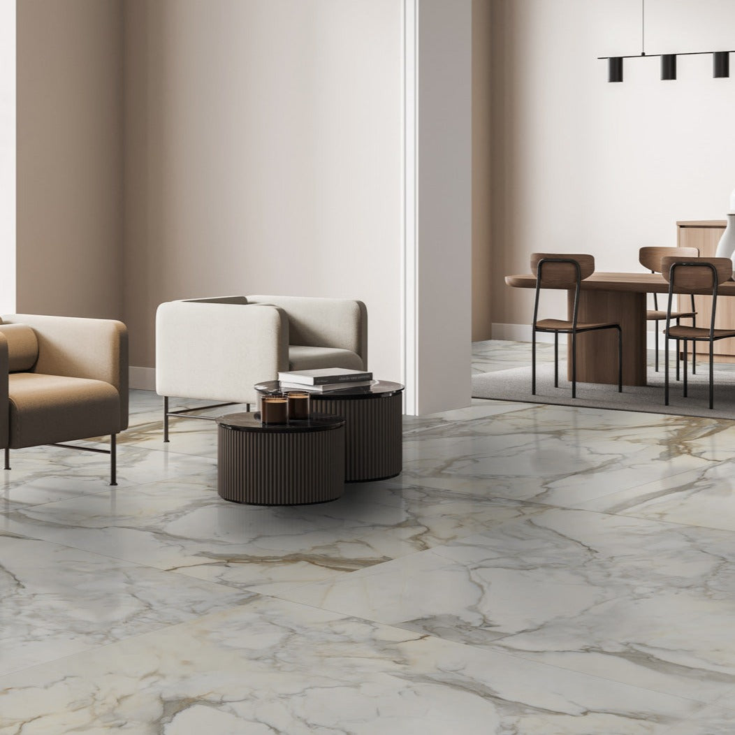 Calacatta Borghini polished porcelain tile with a white marble design, for floors and walls. Made in Italy, installed in a room.