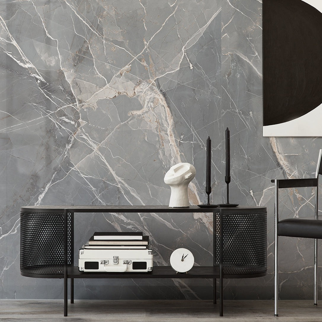 Thunder matte porcelain tile with a marble design, for floors and walls. Made in Italy, installed in a room.