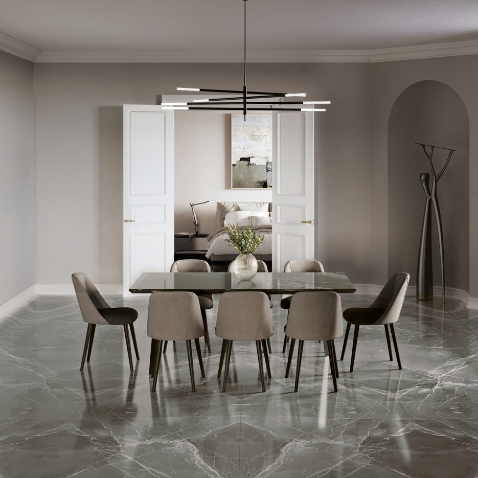 Thunder polished porcelain tile with a marble design, for floors and walls. Made in Italy, installed in a room.