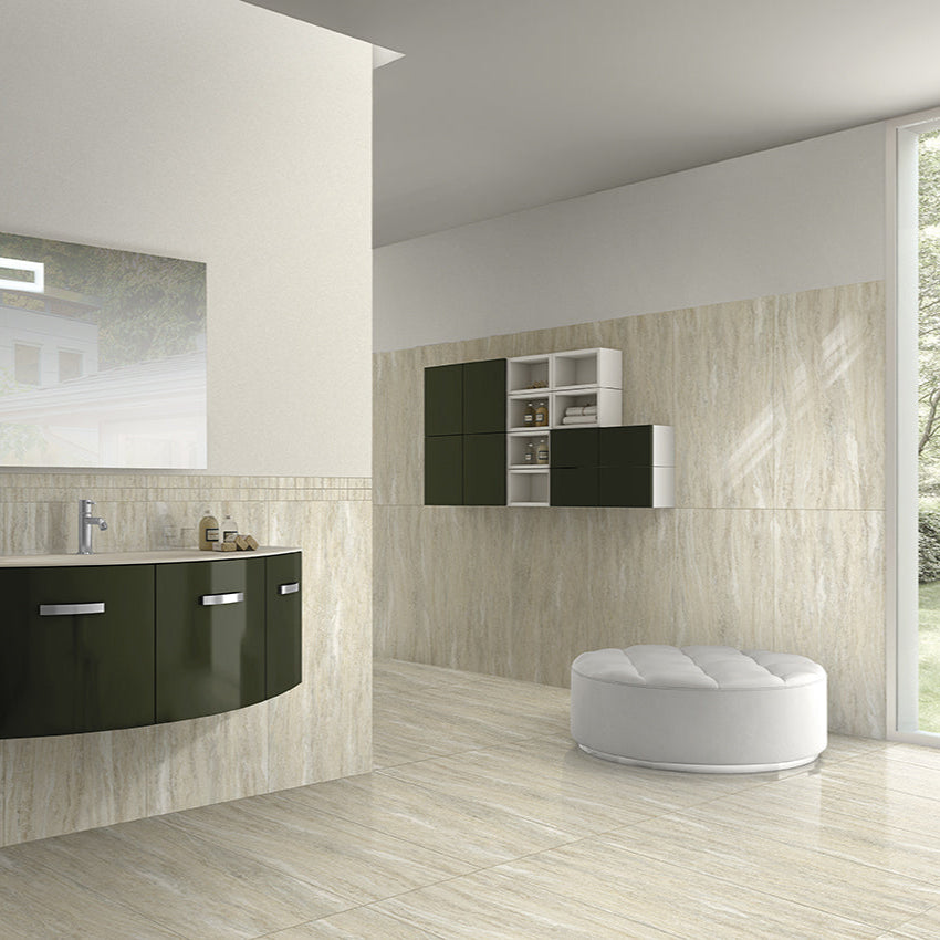 Vision Travertino Natural travertine style polished porcelain tile for floor and wall made in Italy. Installed in room.