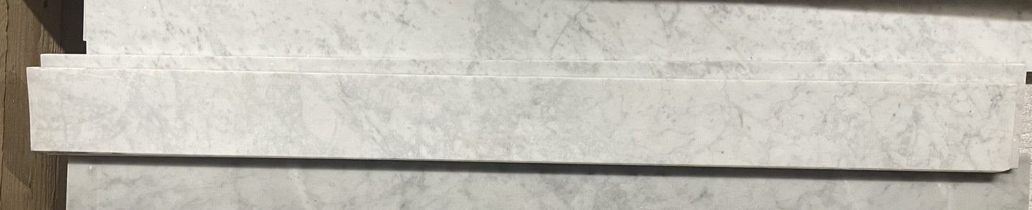 White Carrara marble threshold in a 3x48", 4x36", or 4x48" size.